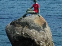 MYSTERY: Girl on a rock, but where?