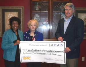 A $10,462 Jackson EMC Foundation grant will help students taking English as a second language classes offered by Interlocking Communities become more productive citizens. From left are Jackson EMC Foundation chair Beauty Baldwin, Interlocking Communities Executive Director Louise Radloff and Jackson EMC Commercial/Industrial Marketing Representative Todd Evans.
