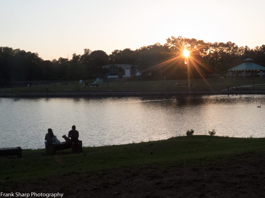 Sunset hangs over Senior Center as seen from City Lake