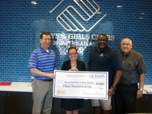 A $15,000 grant from the Jackson EMC Foundation will help the Boys & Girls Clubs of Metro Atlanta’s Lawrenceville Unit provide homework help and specialized tutoring to improve club members’ math and reading skills. Show are (from left) Jackson EMC District Manager Randy Dellinger, BGCMA representative Siobhan Alvarez, BGCMA Lawrenceville Unit Executive Director John Reid and Jackson EMC Foundation board member Jim Puckett.