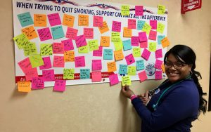 Eastside Employee Sha’Neka Wright-Register posting her words of encouragement in support of those pledging to quit smoking in honor of the Great American Smokeout.