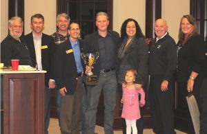 Among dignitaries at the Sugar Hill second annual Community Appreciation Banquet were, from left, Council Member Curtis Northrup; Mayor Pro Tem Brandon Hembree; Council Member Mike Sullivan; Council Member Marc Cohen’ Volunteer of the Year Chris Walker; Chris’ wife and daughter, Gina and Ana; Mayor Steve Edwards; and Council Member Susie Gajewski.