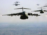 C-17s in the sky over a home base in Charleston, S.C.  Air Force photo.
