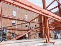 Workers erecting steel products.  Photos provided.