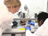 At work in the laboratory are Faith Carlisle (left), Claude David Mbemba (right). Provided.